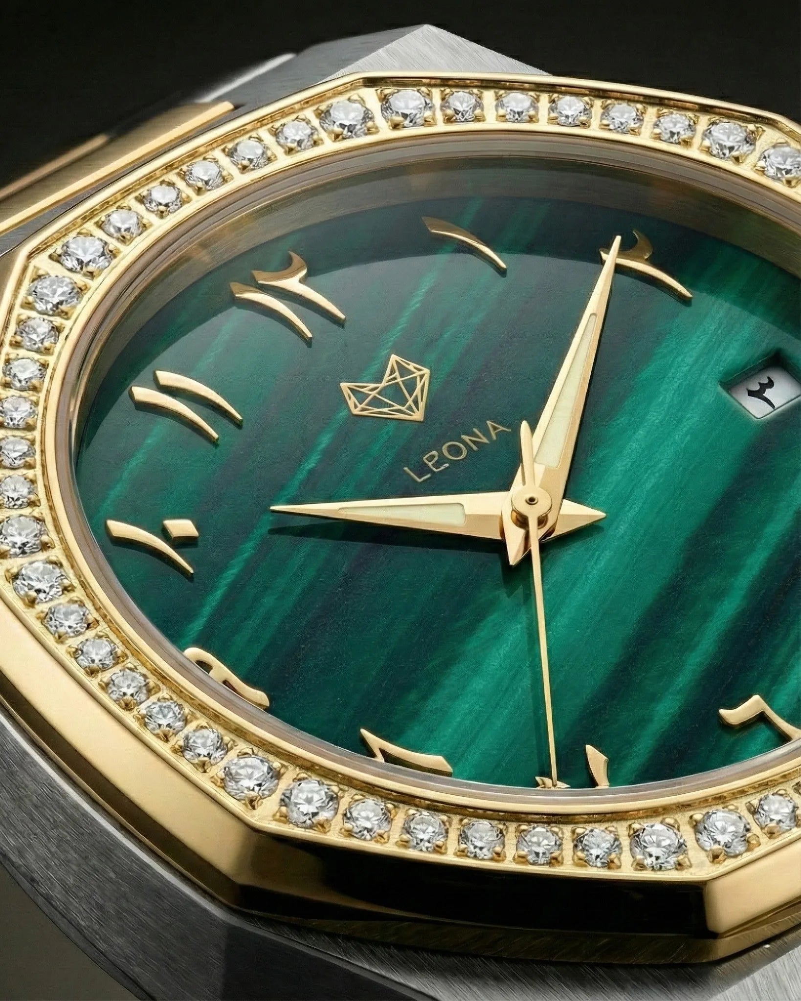 Luxury watch with green face, gold accents, and diamond bezel.